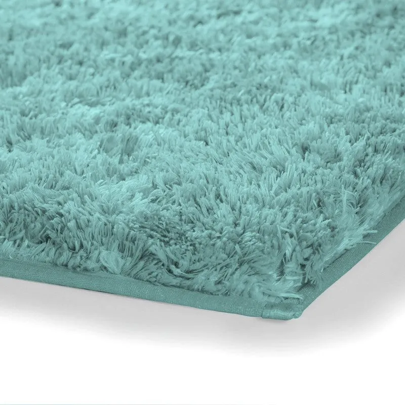 Detailed view of the plush sea blue micro fibre bath mat surface
