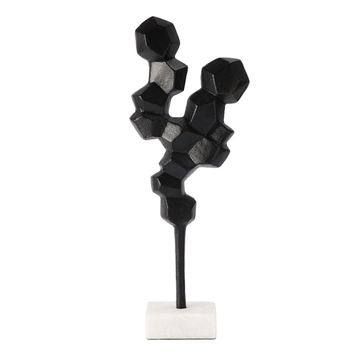 Front view of a black geometric showpiece with a white rectangular base