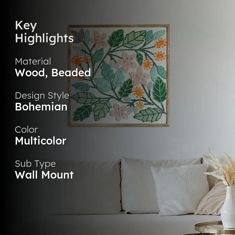 Framed floral beaded wall accent displayed above a sofa in a living room