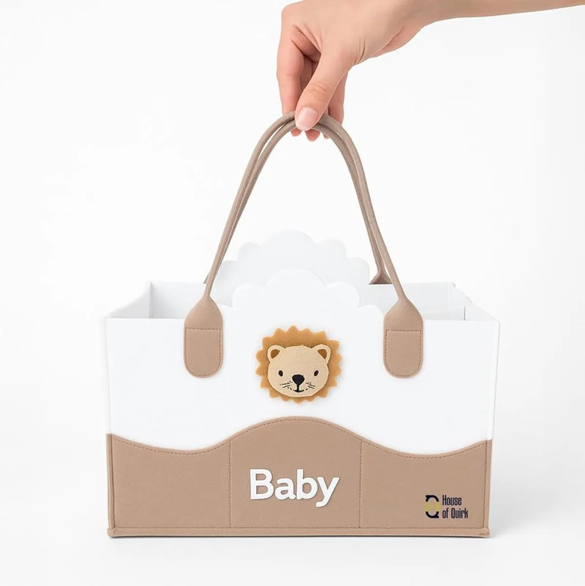 White and beige storage bag with lion detail shown against a white background