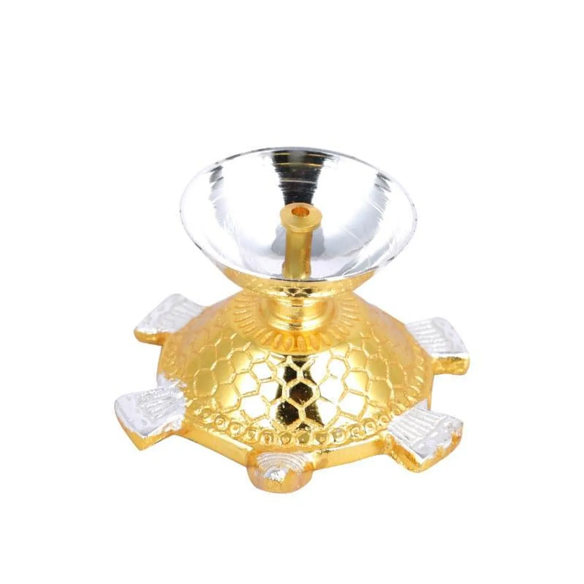 Gold and silver tortoise-shaped brass diya on a white background