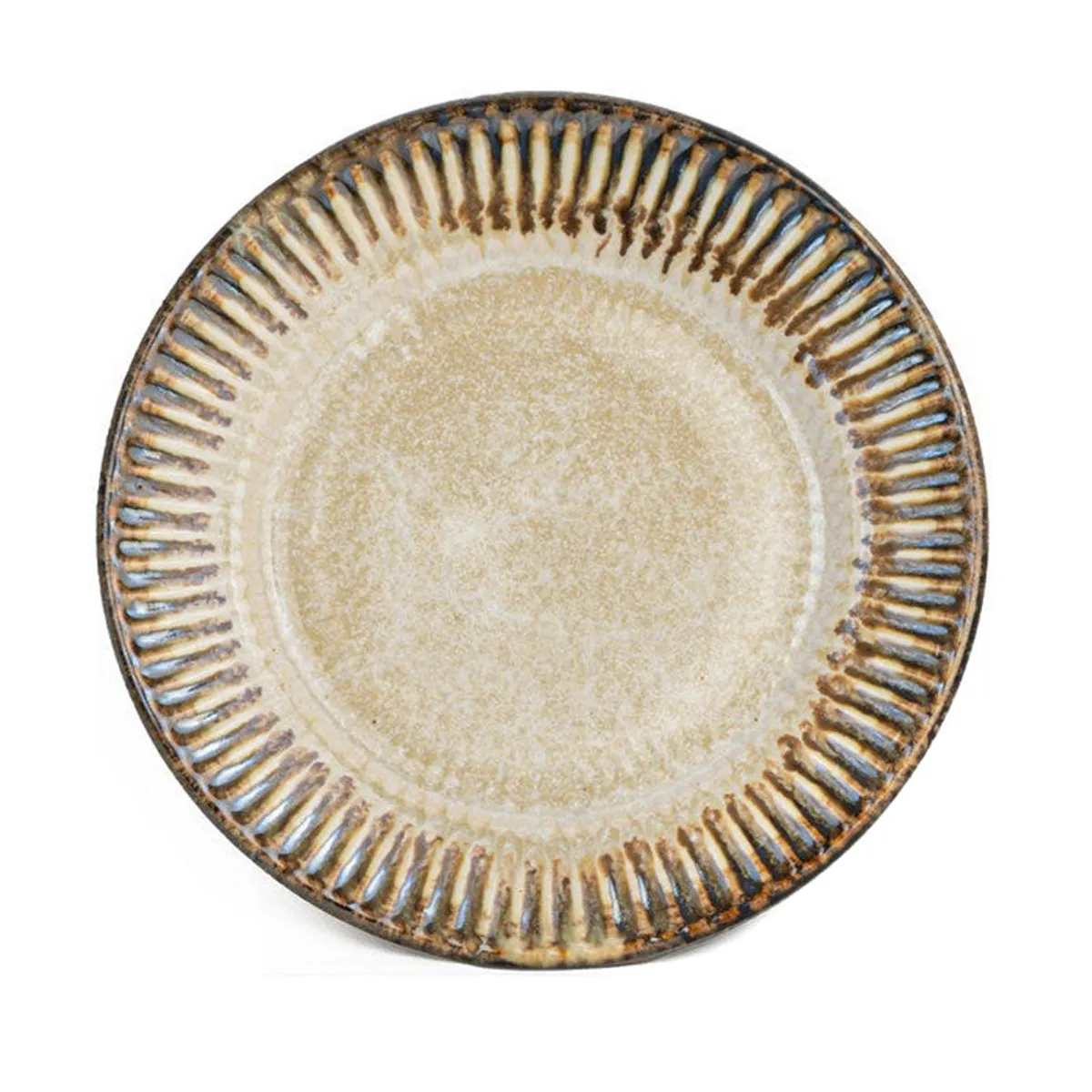 Close-up view of a round beige ceramic quarter plate