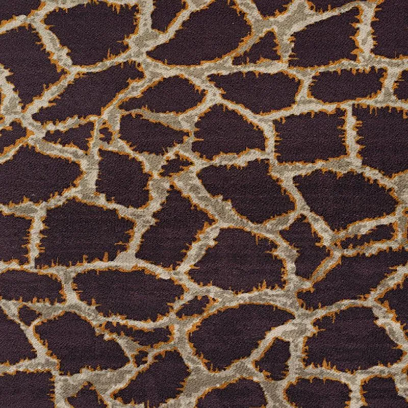 Close-up of the brown and beige abstract carpet pattern