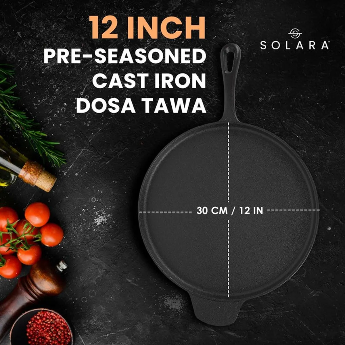 Black round cast iron dosa tawa with handle shown with 30 cm size marking