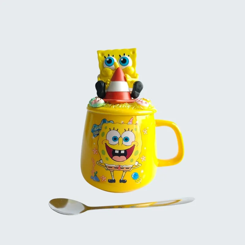 SpongeBob mug with decorative lid and spoon against a plain background