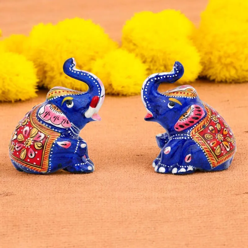 Tusked Triumph Painted Metal Show Piece - Set Of Two media 1