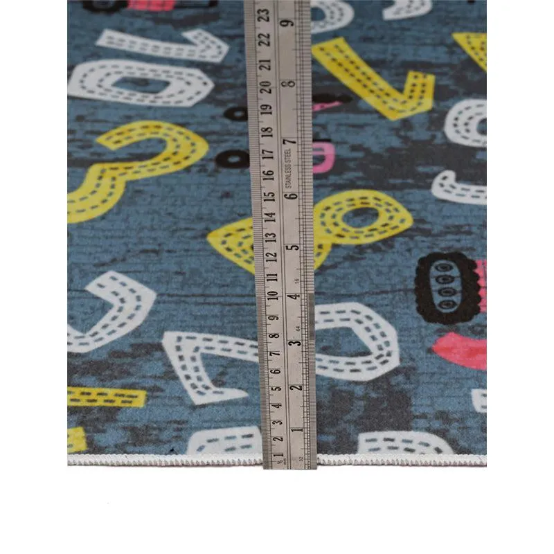 Close-up of the carpet surface with number pattern and a ruler placed on top