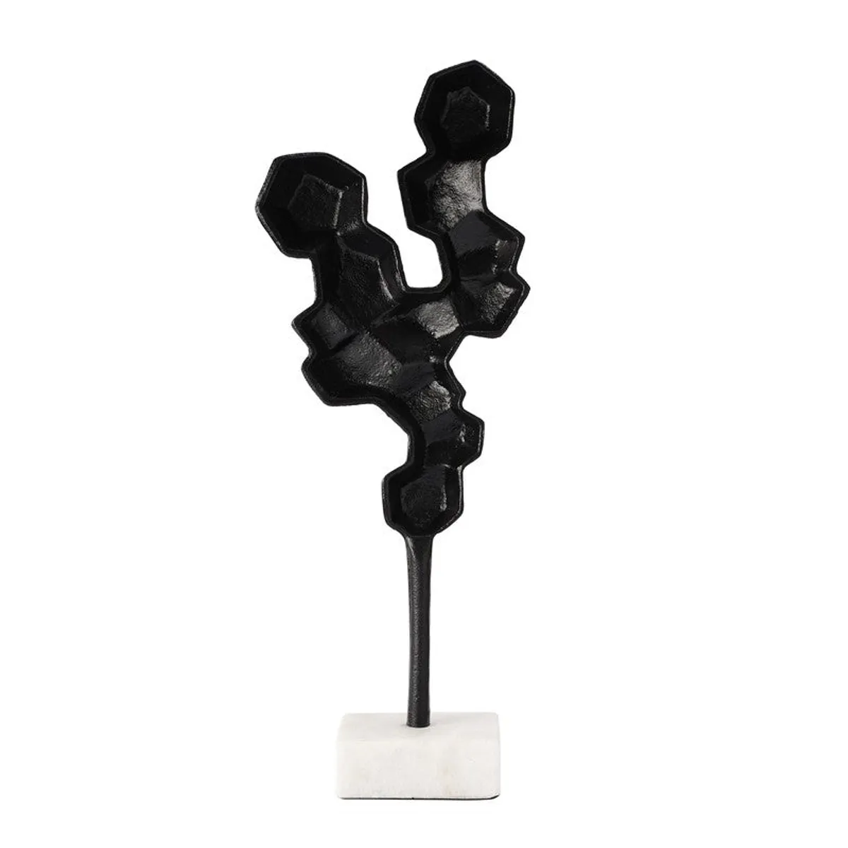 Rear view of the black geometric tabletop showpiece on a white base