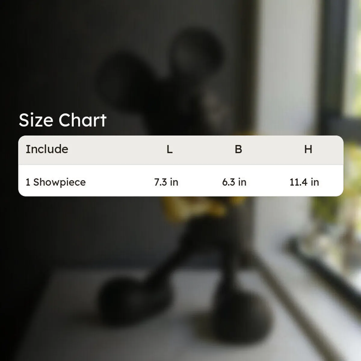 Blurred tabletop figurine background with a size chart card overlay.