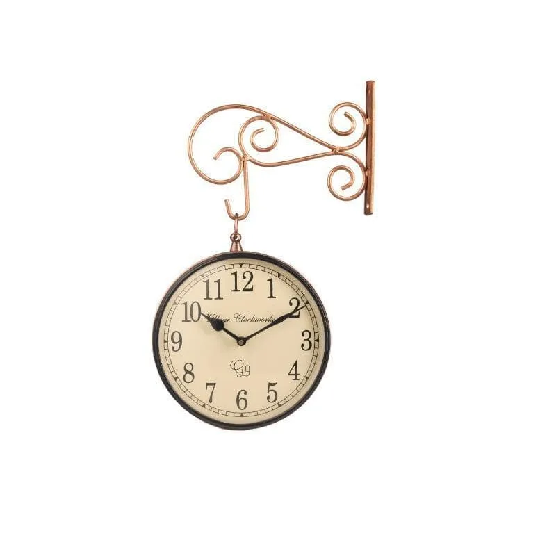 Vintage copper wall clock with Roman numerals and decorative curved bracket
