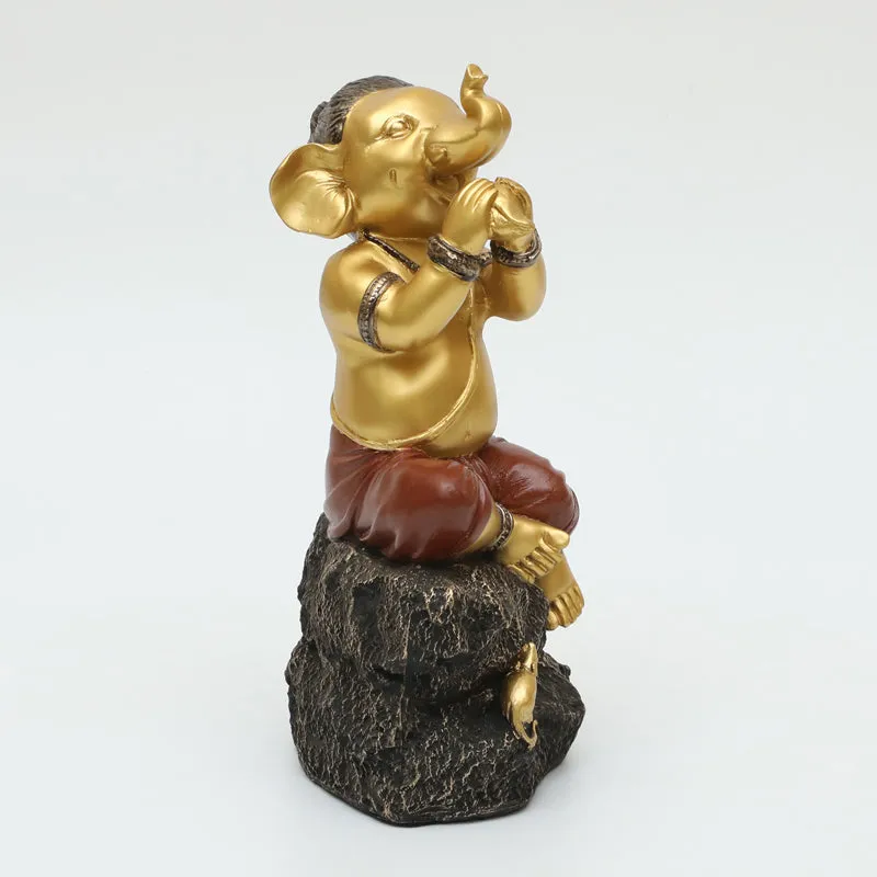 Playful Vinayaka Polyresin Showpiece - Gold & Black media 4