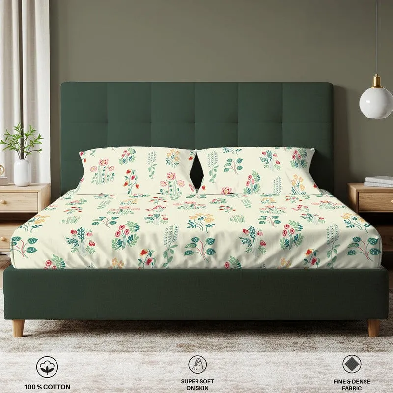 Front view of floral fitted bedsheet set with two matching pillow covers