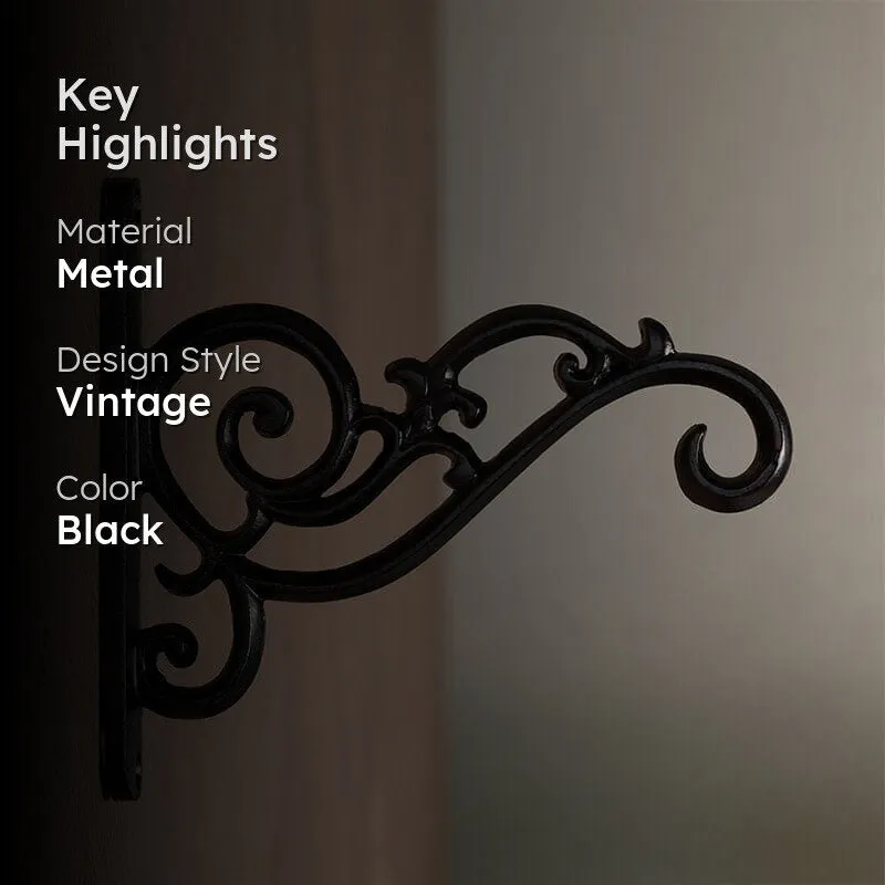 Close-up of the black metal bracket showing its vintage scrolling design.