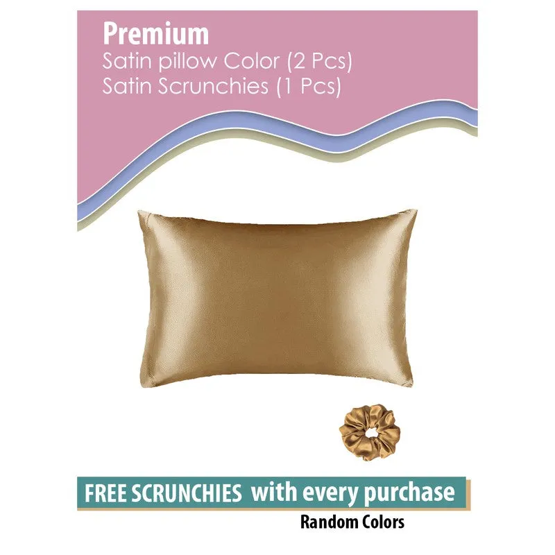 Gold satin pillow cover and scrunchy displayed together.
