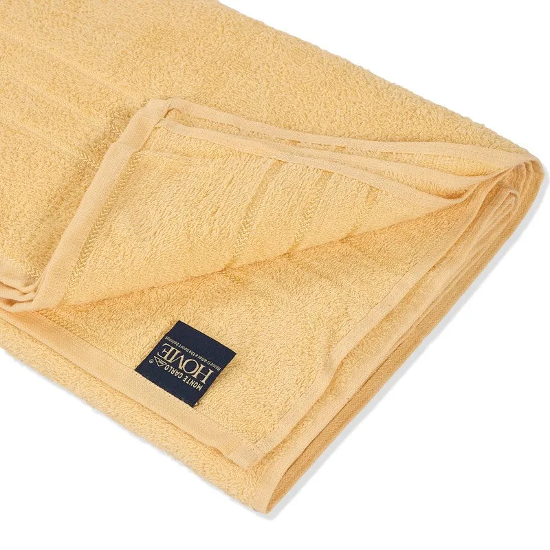 Close-up of the folded yellow towel showing its soft terry texture