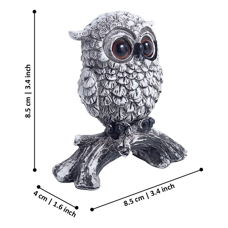 Angled view of the owl figurine with dimension lines around it