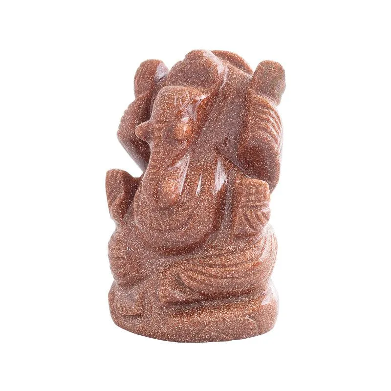 Red agate Lord Ganesha showpiece with glossy speckled finish