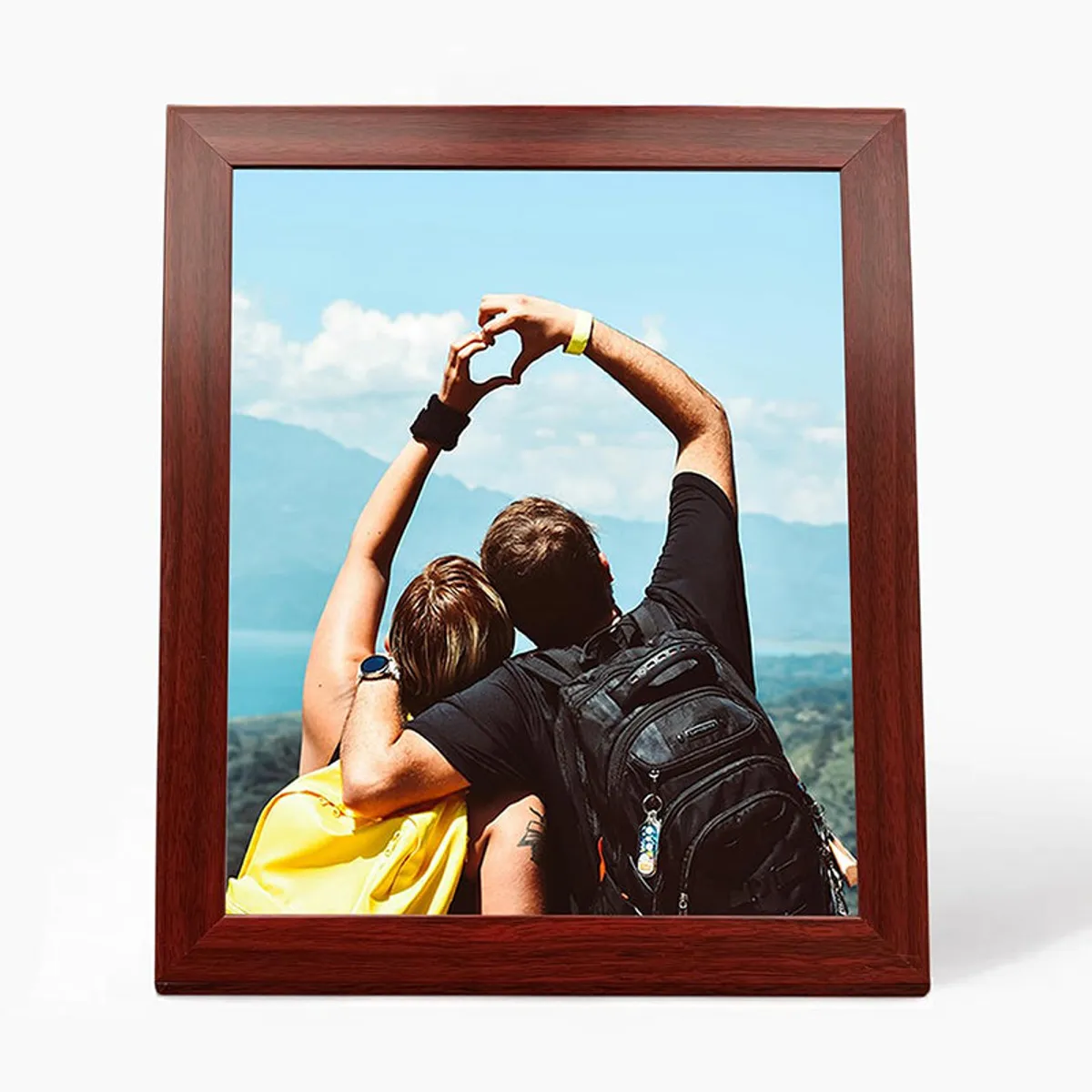 Single brown wooden frame displaying a travel photograph
