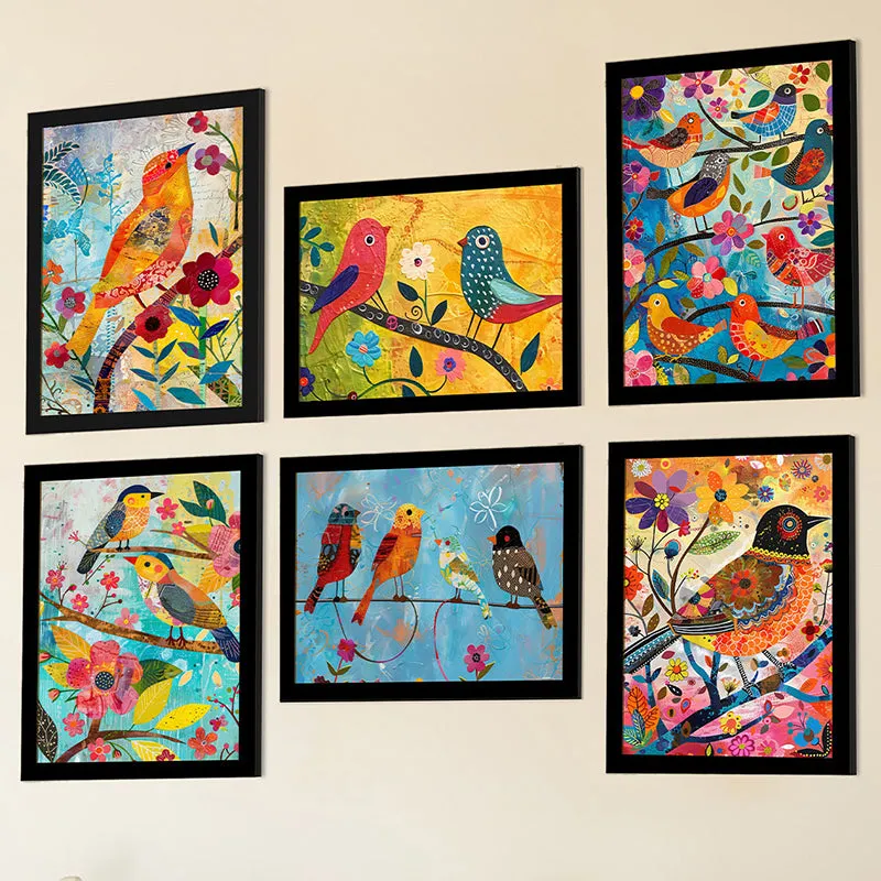 Angled view of six framed bird and floral artworks displayed together on a wall.