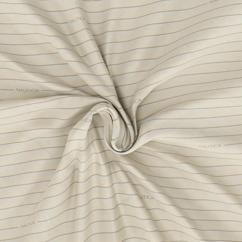 Close-up of brown striped cotton bedsheet fabric