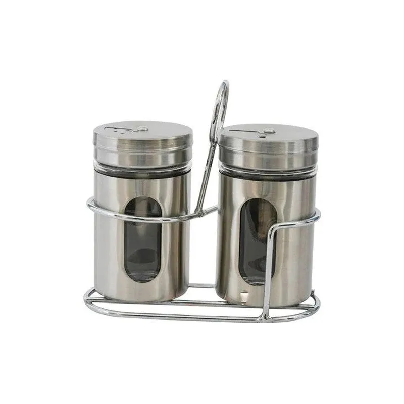 Two silver spice jars with dark contents shown in their stand.