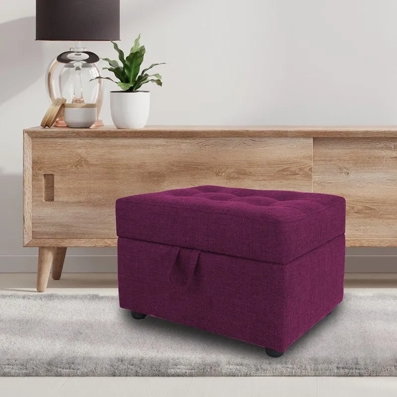 Purple ottoman placed beside a wooden console