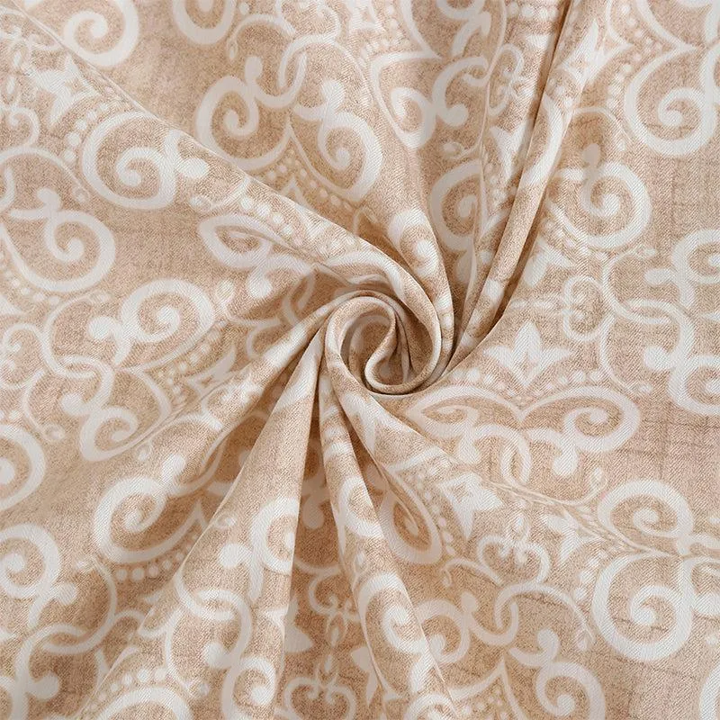 Close-up of brown and white printed cotton fabric twisted to show texture