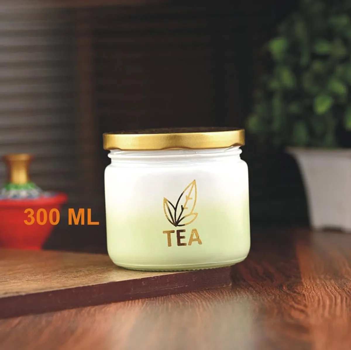 Frosted tea jar with golden lid shown at 300 mL capacity