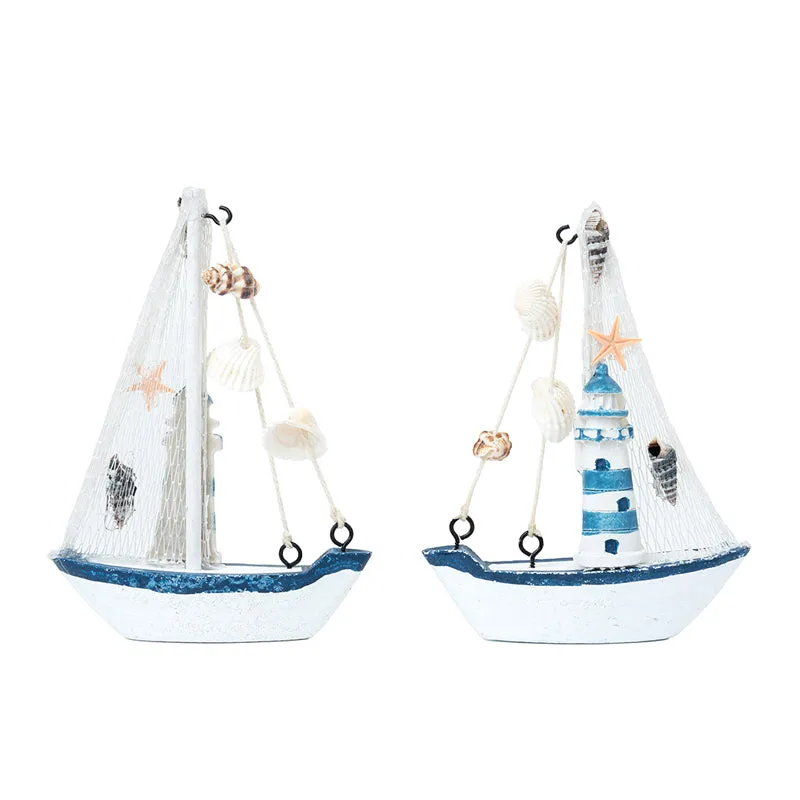 Two views of the white and blue sailboat showpiece displayed side by side