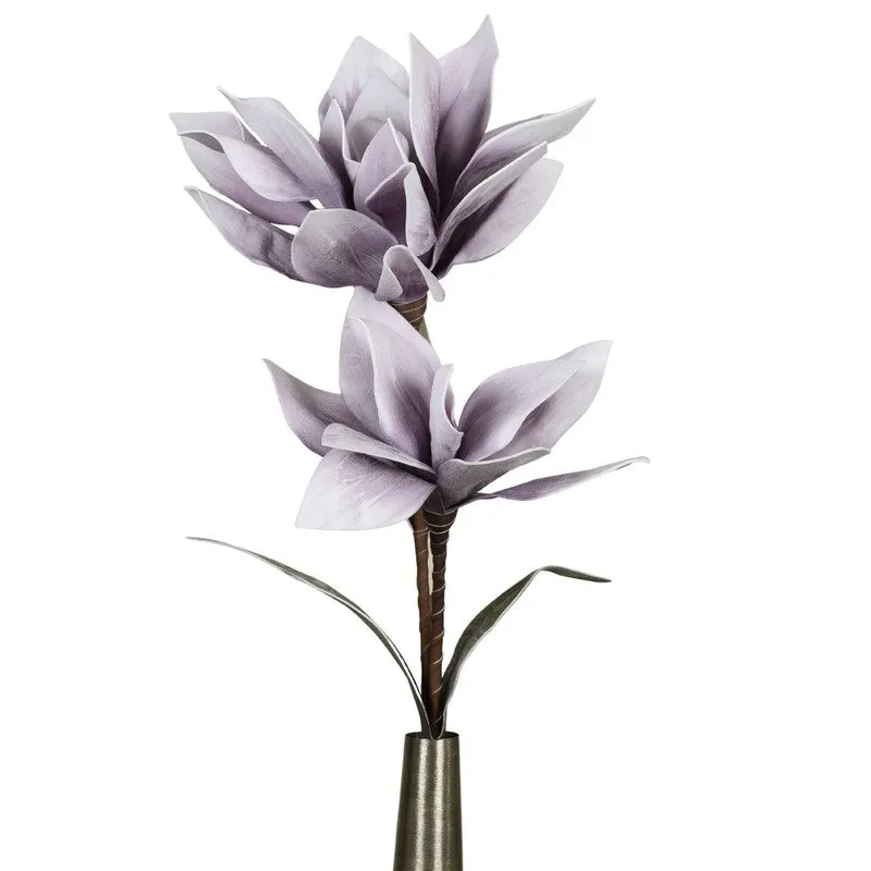 Purple artificial flower stick shown against a white background