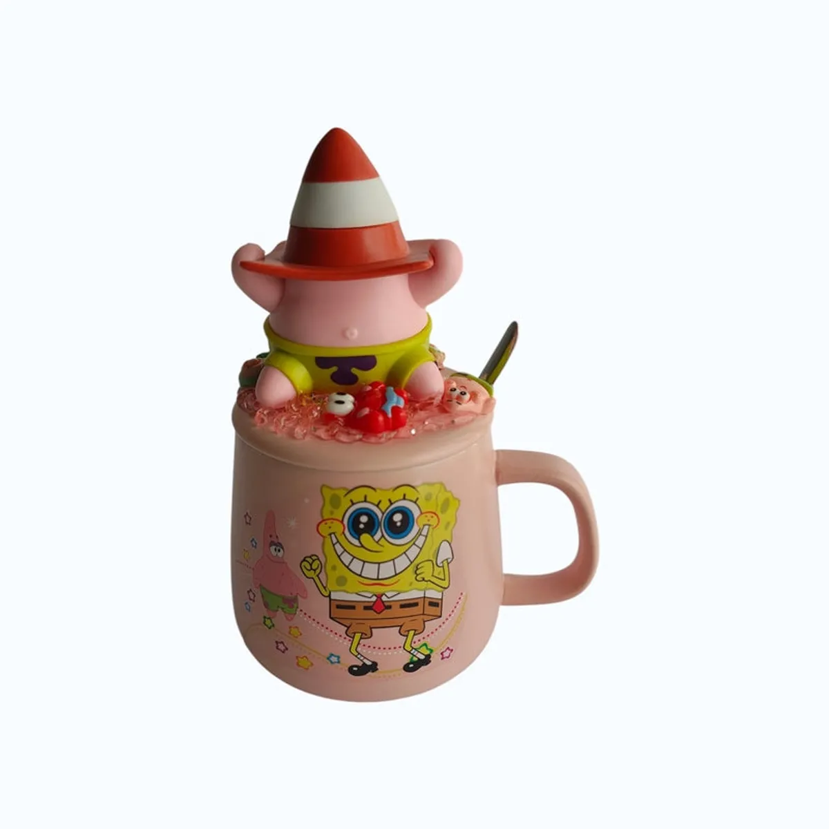 Front view of pink cartoon mug with raised figurine lid
