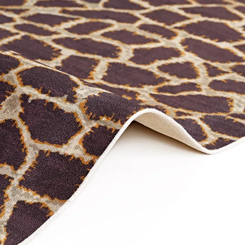 Close-up of the carpet edge and underside in brown and beige
