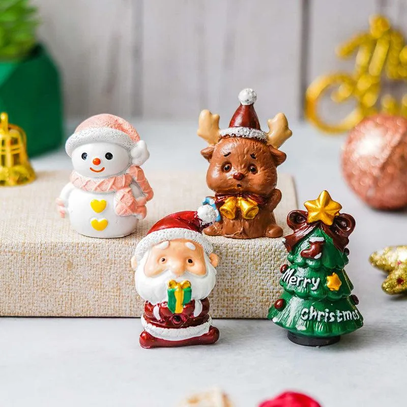 Spirit Of Christmas Resin Figurine - Set Of Four media 1