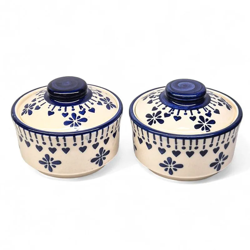 Pair of blue and white ceramic serving bowls with matching lids