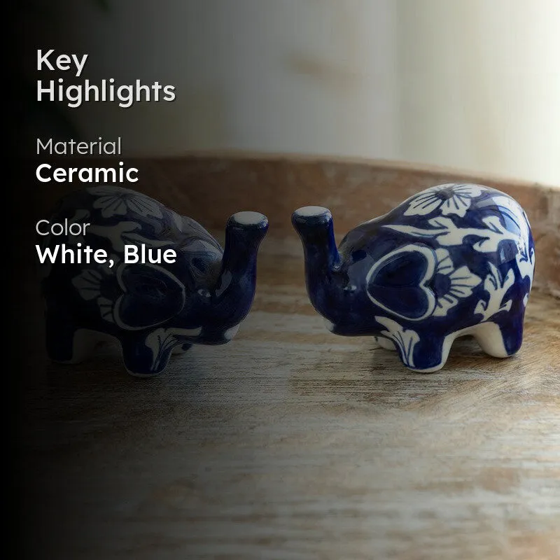 Blue and white floral salt and pepper shakers with material and colour highlight