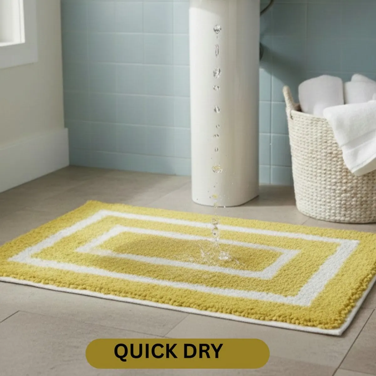 Yellow and white geometric bath mat shown absorbing water in a bathroom