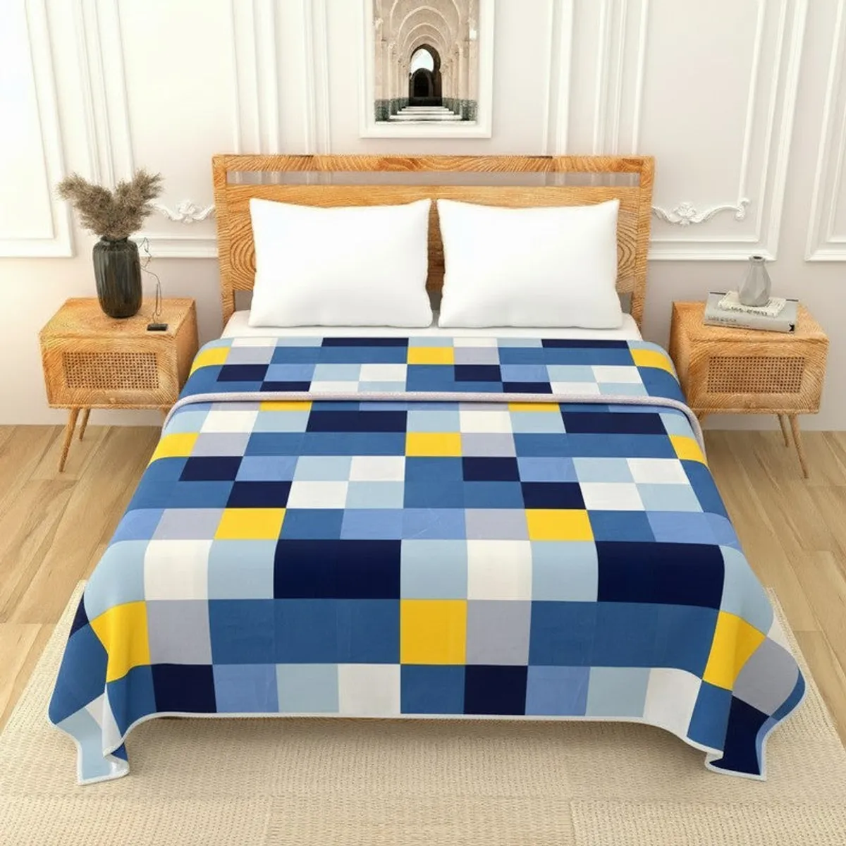 Multicolour geometric checked dohar styled on a bed
