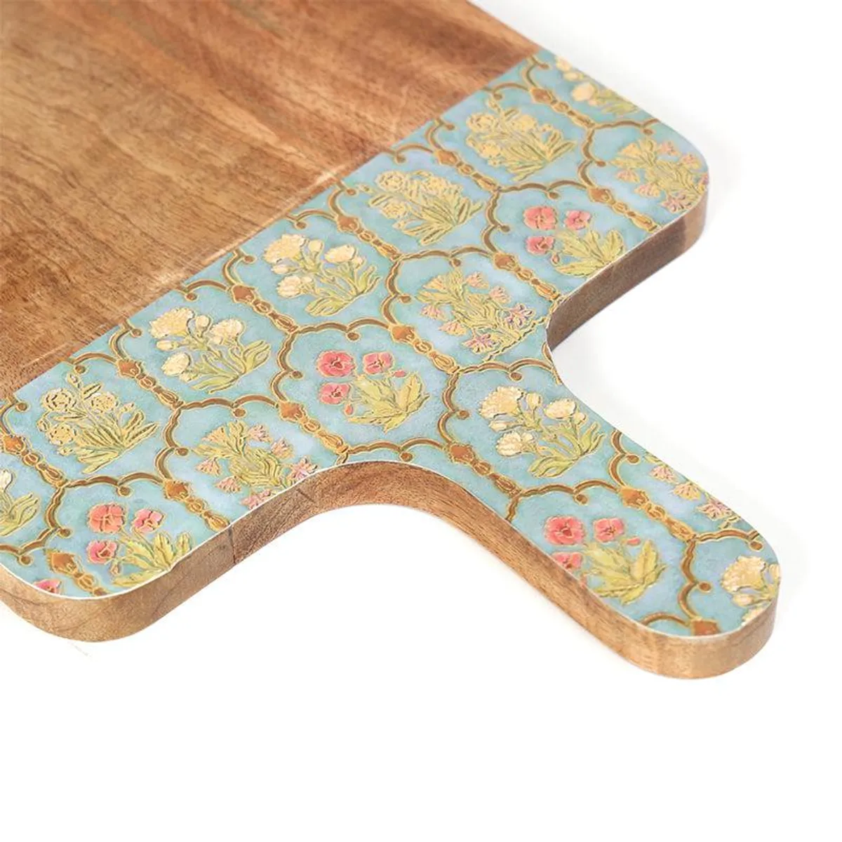 Close-up of teal floral patterned section on a mango wood platter