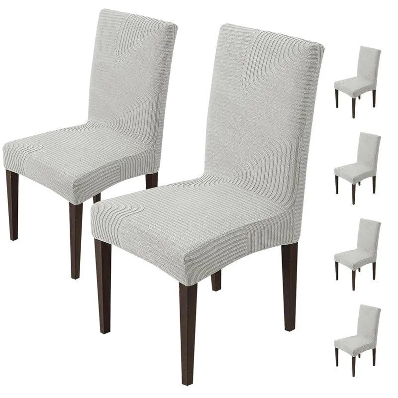 Grey textured chair covers shown on dining chairs, with multiple views