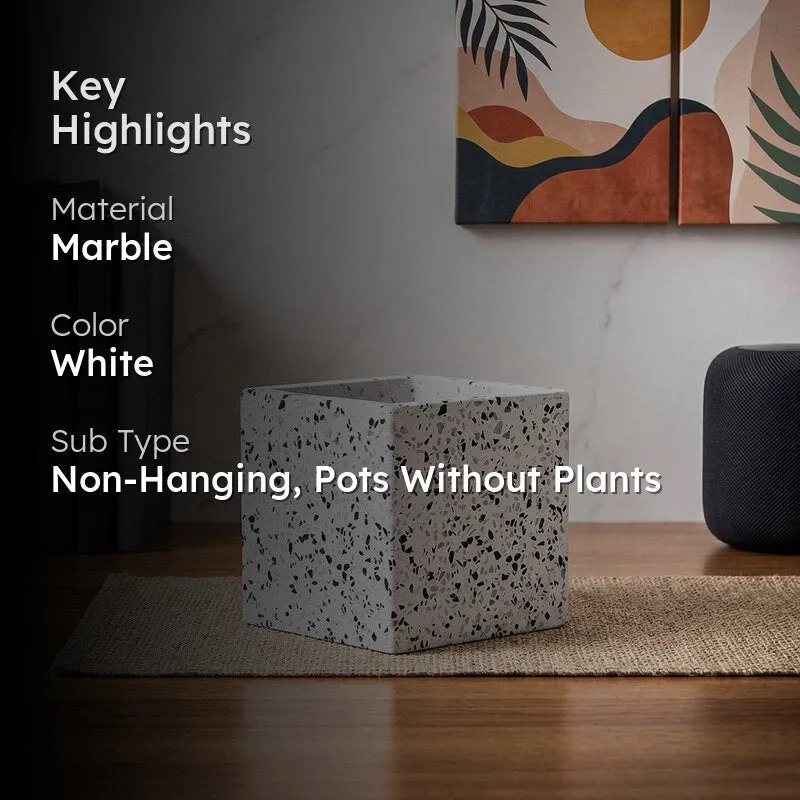 Square white terrazzo marble planter in a styled room setting