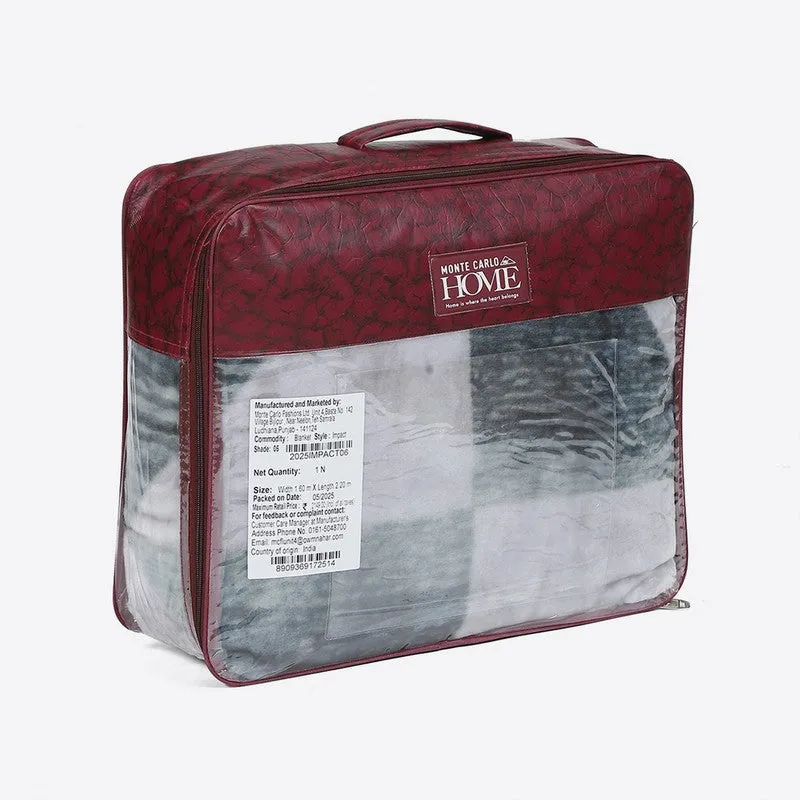 The blanket shown packed in a zippered maroon storage bag