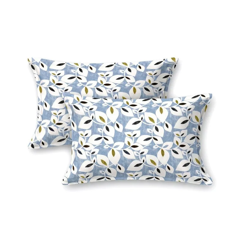 Two matching pillow covers in blue with white leaf print