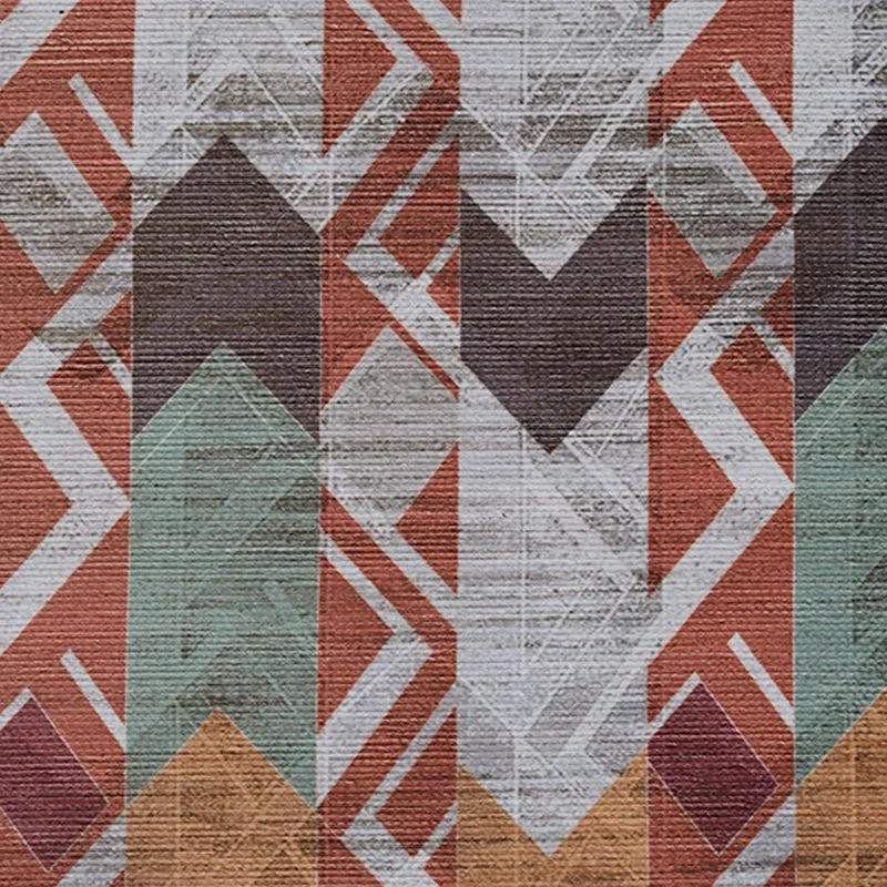 Close-up of geometric pattern with maroon, green and grey shapes