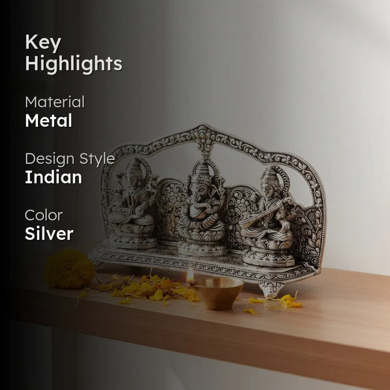 Silver-toned Lakshmi Ganesha Saraswati idol with highlighted material and colour