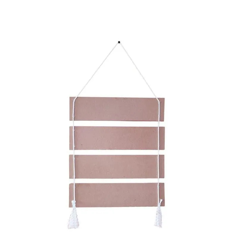 Back view of a four-panel wall hanging with hanging cord and white tassels