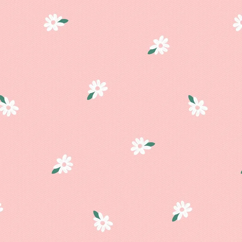 Close-up of pink curtain fabric with small white flowers