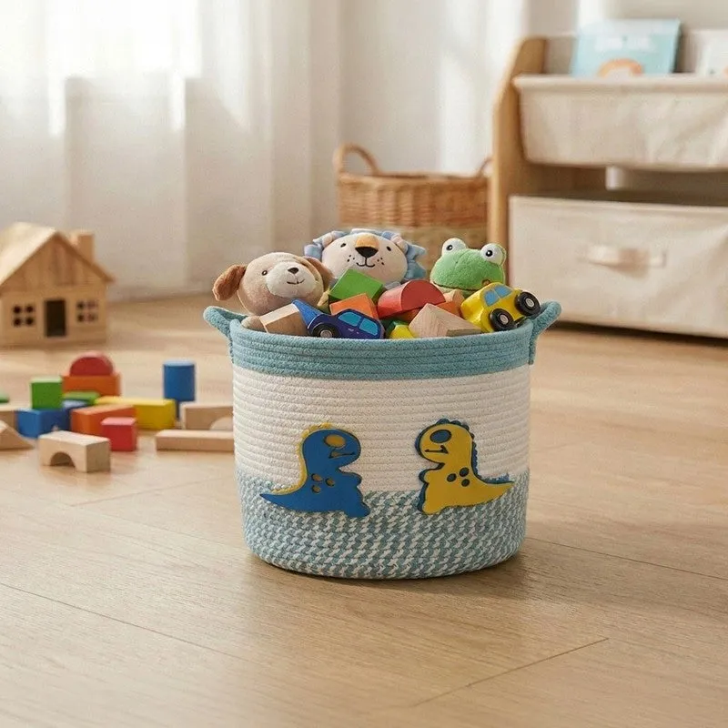 Blue, white and yellow dinosaur-themed cotton storage basket filled with toys in a kids room