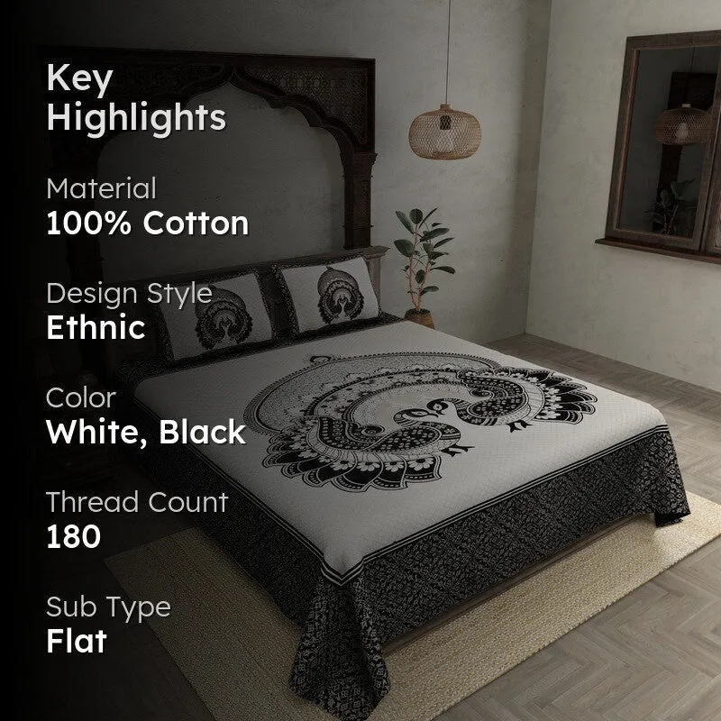 Styled bedroom image showing the black and white ethnic bedsheet on a bed