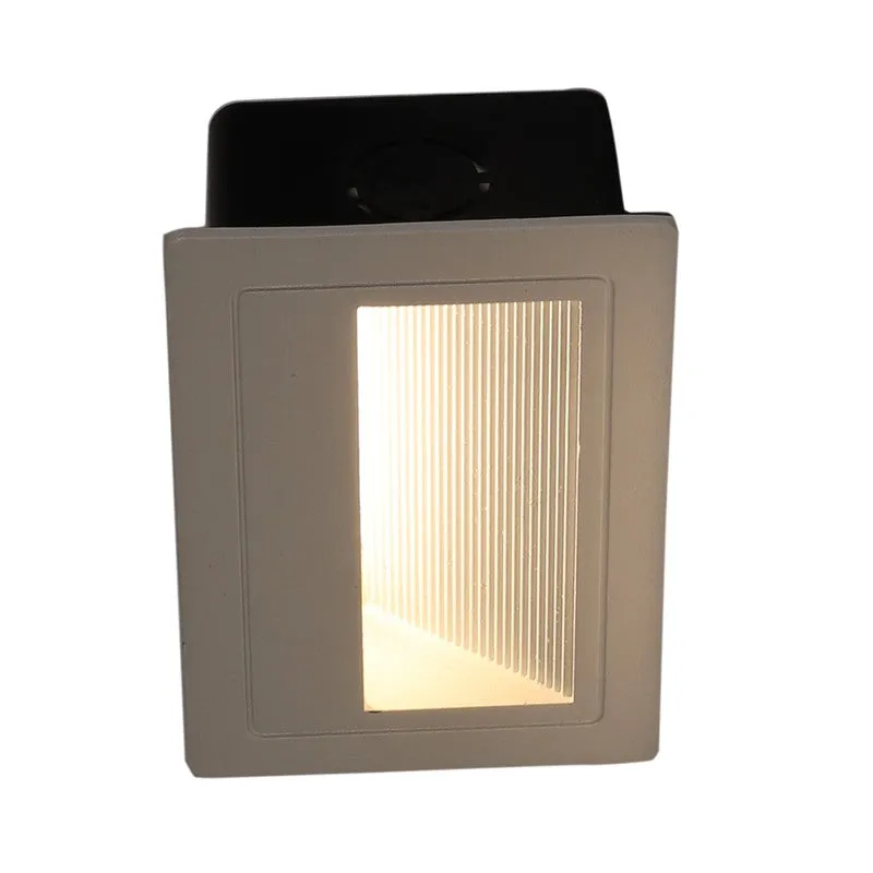 Vertical view of the white step light with illuminated ribbed panel