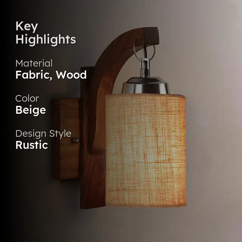 Wooden and fabric wall lamp glowing warmly against a dark background